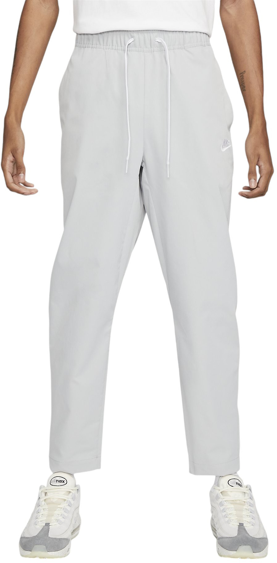 M NK CLUB WVN TAPER LEG PANT