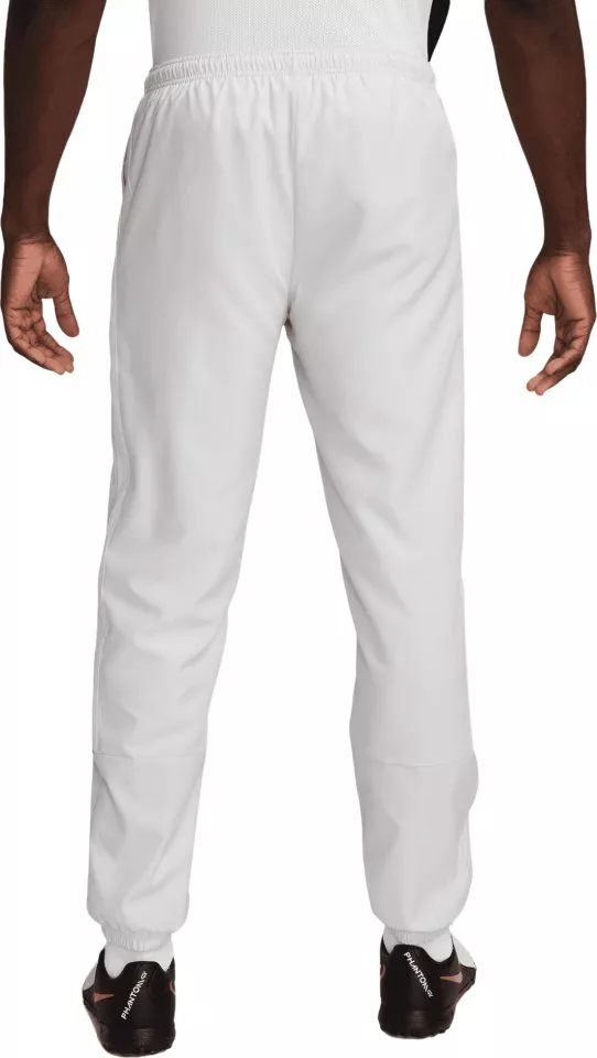 Hlače Nike M NK REPEL ACADEMY+ TRK PANT W