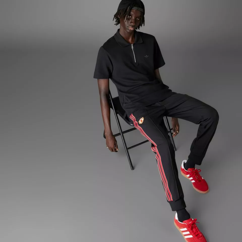 Hlače adidas Originals MUFC ICON TP