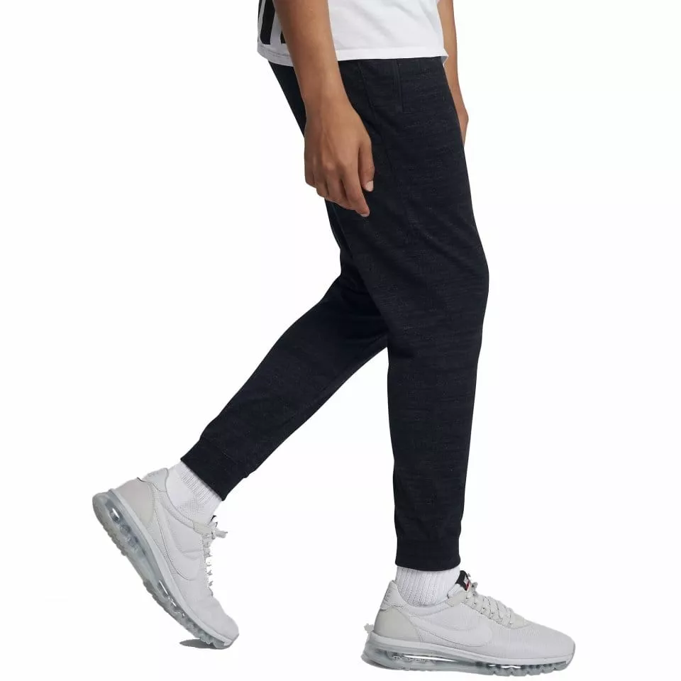 Pánské běžecké kalhoty Nike Sportswear Advance 15