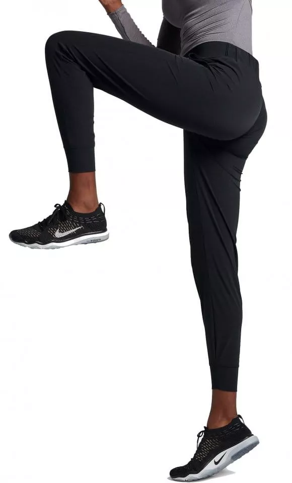 Dámské tréninkové kalhoty se středně vysokým pasem Nike Bliss Lux