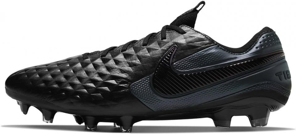 white and black football boots