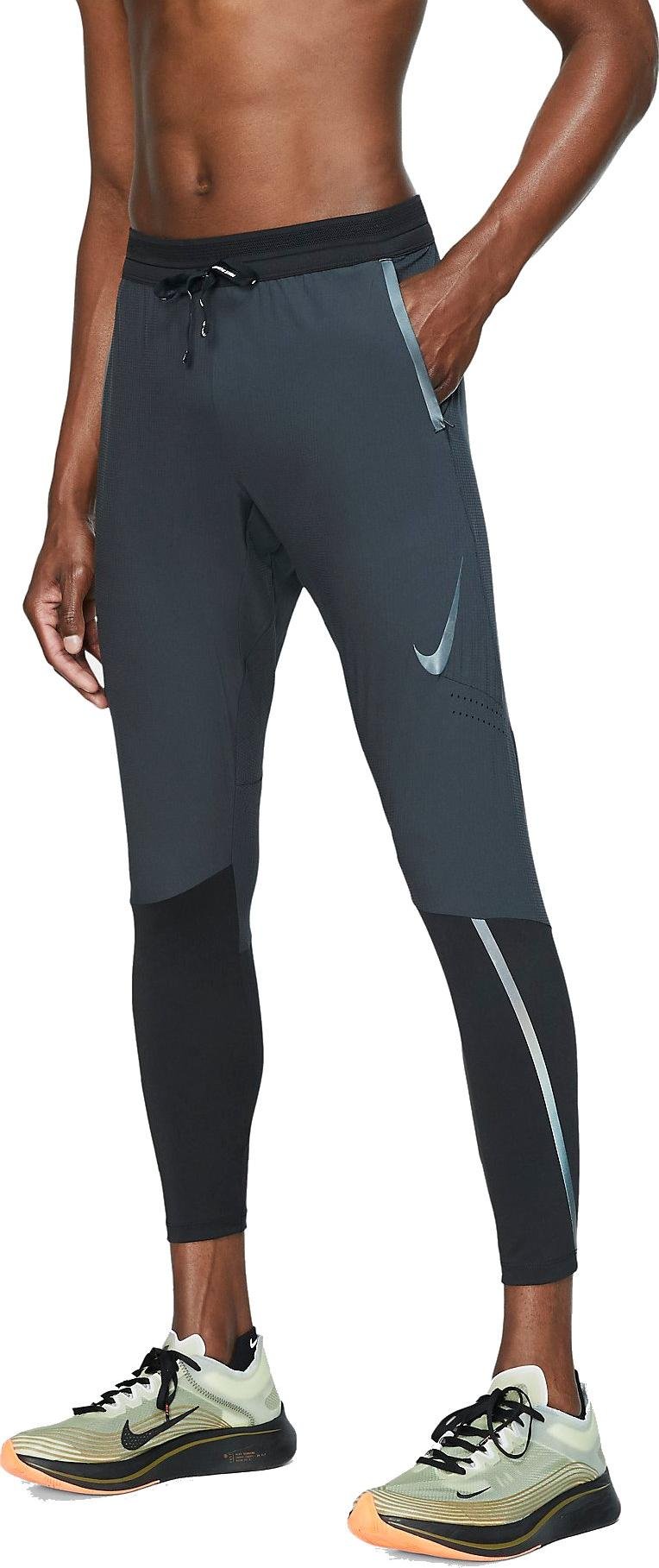 Nike M NK SWIFT PANT Nadrágok