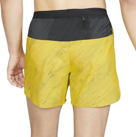 nike trail shorts yellow