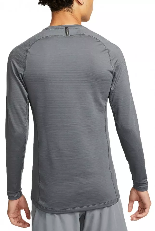 Тениска с дълъг ръкав Nike Pro Warm Sweatshirt Grau Schwarz F068