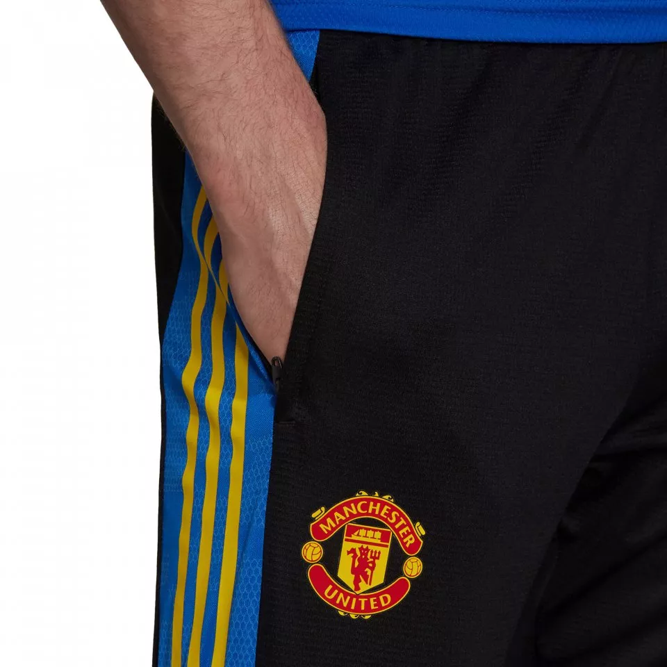 Pantaloni adidas MUFC EU TR PNT 2021/22