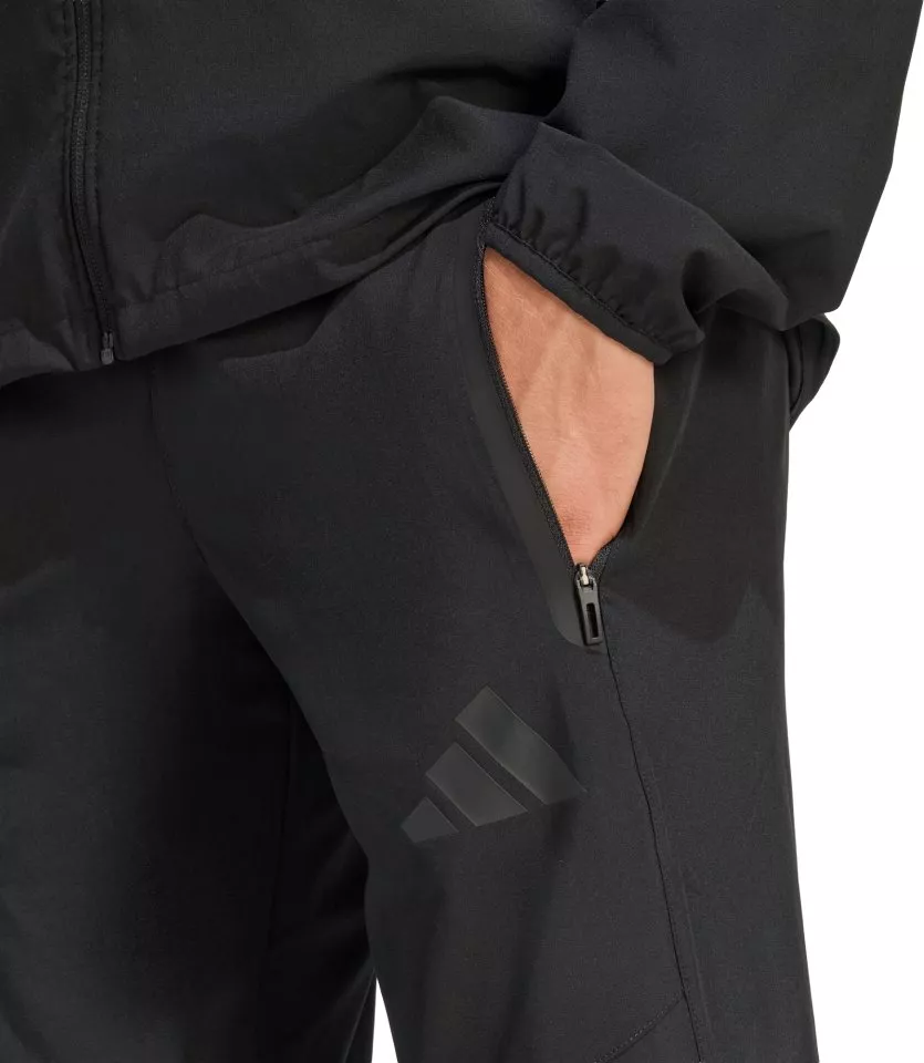 Spodnie adidas Tiro Travel Woven