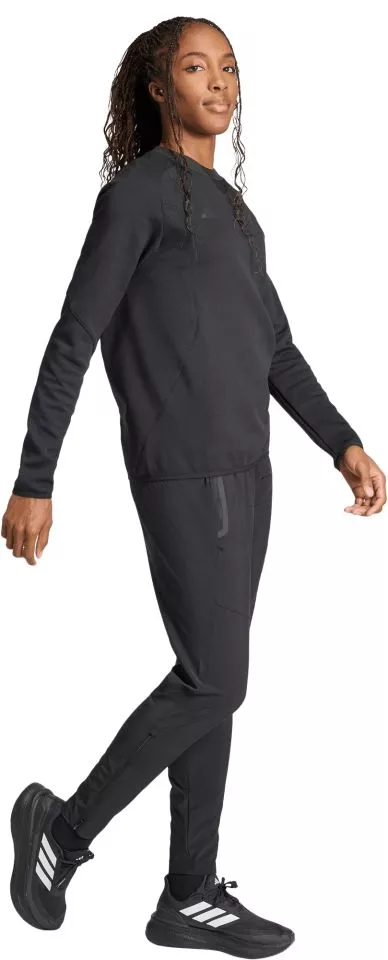 Pantaloni adidas Tiro Travel Woven Women