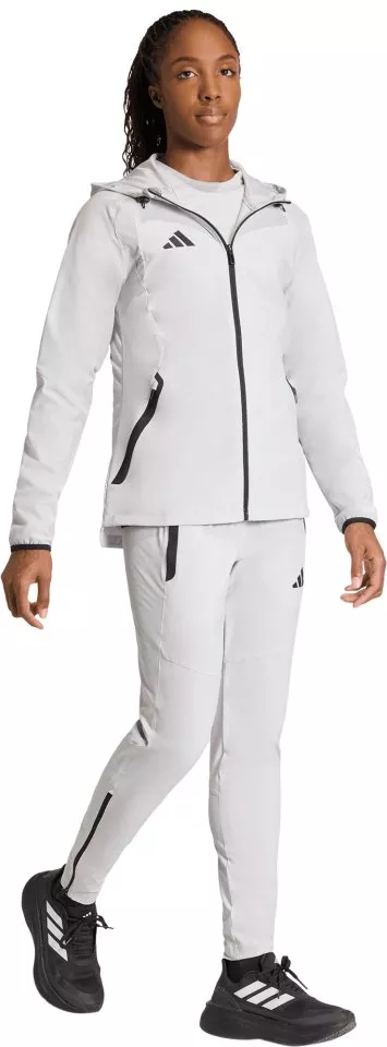 Τζάκετ με κουκούλα adidas  Tiro Travel Windbreaker Women