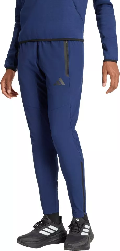 Calças adidas Tiro Travel Woven Women