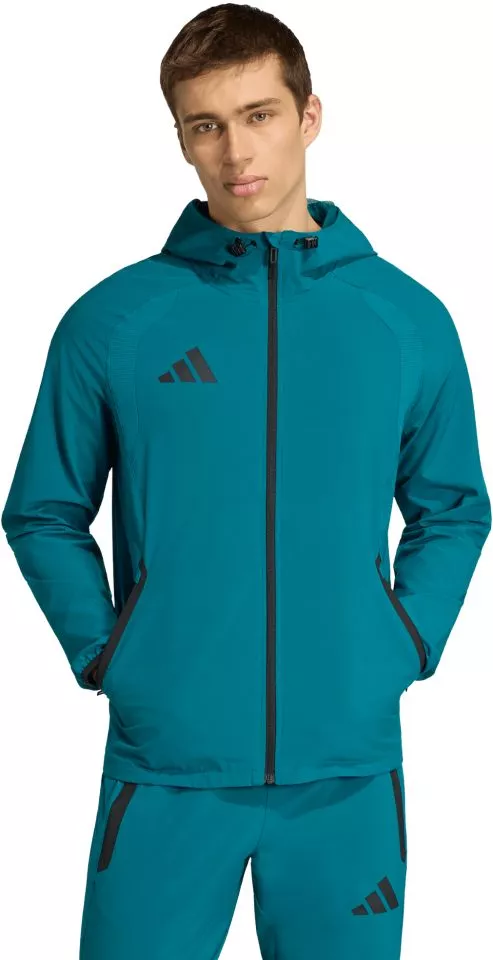 Pantaloni adidas Tiro Travel Woven