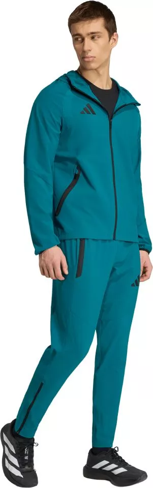Pantaloni adidas Tiro Travel Woven
