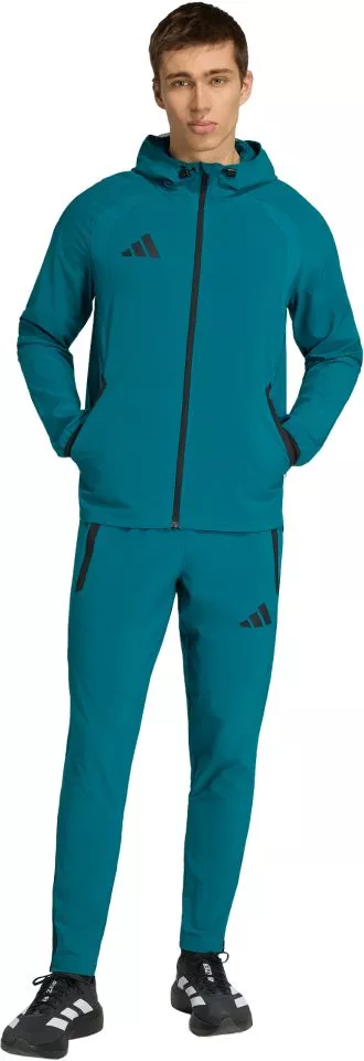 Pantaloni adidas Tiro Travel Woven