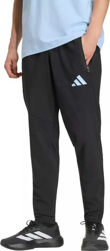 adidas Tiro Travel Woven Nadrágok