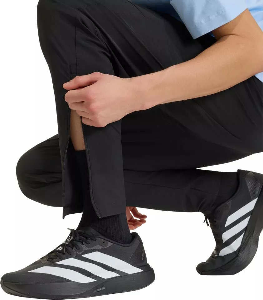 adidas Tiro Travel Woven Nadrágok
